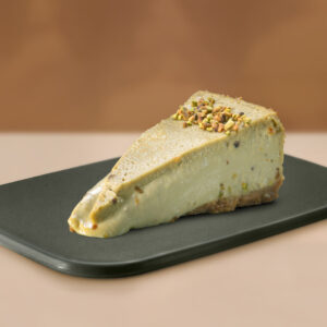 tarta de queso pistacho porción